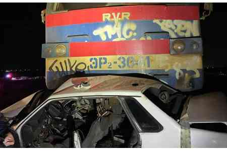 Train and car collide: two killed